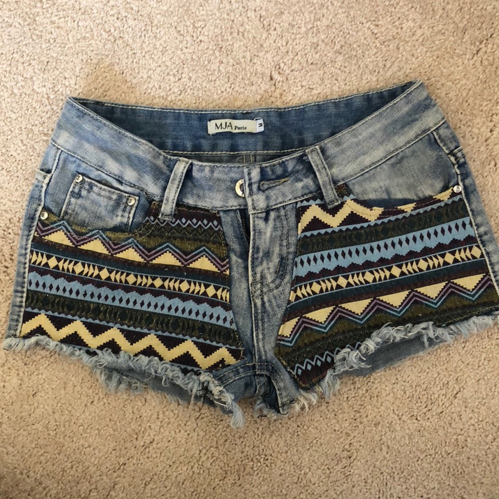 Tribal print jean shorts.